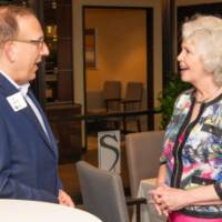 marcia talks with man